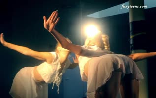 Elena's Supple Flexibility: Blonde Gymnast Bends Naked