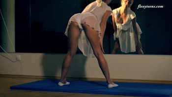 Elena's Supple Flexibility: Blonde Gymnast Bends Naked