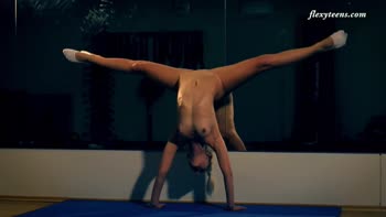 Elena's Supple Flexibility: Blonde Gymnast Bends Naked