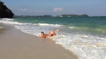 Stunning 18-Year-Old Blonde Bares Her Big Breasts at the Beach