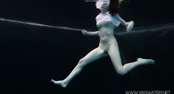 Underwater Seduction: Russian Teen (18+) Andrea Swims Naked in HD