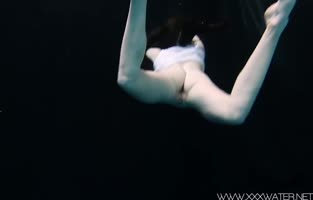 Underwater Seduction: Russian Teen (18+) Andrea Swims Naked in HD