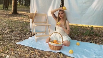 Blonde Delight: Soft Solo Seduction in Nature's Lap