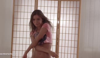 Lily Chey Sizzles in Seductive Solo Stripdown
