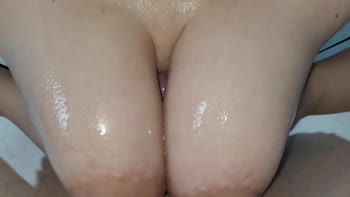 Unbridled Lust: Russian Babe's Oiled Tits Drive Him Wild