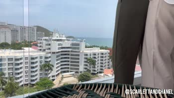 ScarlettandChanel's Balcony Bliss: Public Lesbian Seduction
