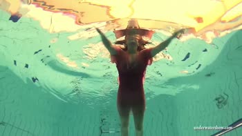 Big Tits Silvie Swims and Shows Hairy Pussy
