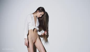 Leona Mia's Sultry Solo: Ultrafilms' Brunette Beauty in Lingerie