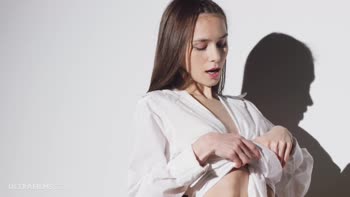 Leona Mia's Sultry Solo: Ultrafilms' Brunette Beauty in Lingerie